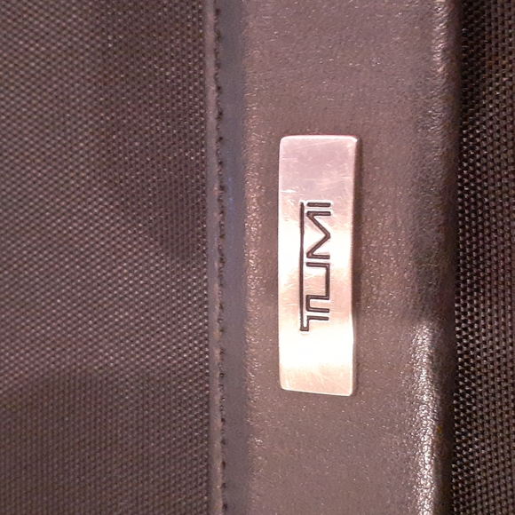 Tumi messenger crossbody.